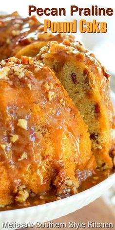 a close up of a bundt cake in a white bowl with pecan pralie toppings