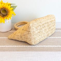 IN STOCK NOW SHIPPING FROM LOS ANGELES Introducing the Elena Handbags Hand Woven Fashion Raffia Top Handle Beach Bag! Perfect for any beach getaway, this bag combines fashion and function with its hand woven raffia material and convenient top handle. Carry all your essentials in style with this must-have accessory. Natural Soft Raffia Straw Handmade Lined Size: 10"H x 16"W x 6’‘D Designer Style ID: 8694 Summer Hobo Bag With Braided Handles And Pouch Shape, Lightweight Rectangular Shoulder Bag For Beach, Lightweight Rectangular Shoulder Beach Bag, Lightweight Natural Rectangular Shoulder Bag, Natural Lightweight Rectangular Shoulder Bag, Beige Rectangular Hobo Bag For Beach, Lightweight Rectangular Straw Bag For Beach, Lightweight Rectangular Straw Bag For Vacation, Rectangular Straw Hobo Bag For Travel