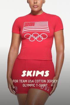 Our viral Cotton Jersey tee with a soft feel and stretchy, body-hugging fit. Detailed with a crew neck, short sleeves, and a length that hits below the natural waist. Features official graphics in support of the Team USA athletes participating in the Olympic Games Paris 2024. Fits true to size. | SKIMS Cotton Jersey Olympic T-Shirt | Red | 2XS | SKIMS For Team Usa Bra Calculator, 2024 Fits, The Olympic Games, Team Usa, Mens Fleece, T Shirt Bra, Jersey Tee, Lingerie Fashion, Olympic Games