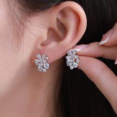 * These earrings are beautiful and easy to wear. They are not only suitable for everyday wear, but also for formal occasions. * A gift for your daughter, mother, and bestie，valentines gift, perfect gift. * The NortiaJewelry store has a lot of jewelry for women: https://www.etsy.com/shop/NortiaJewelry -- TECHNICAL  INFORMATION -- - Item ID：X000857277 - Product category：Earring - Product Color：Platinum Plated - Material：Alloy，zircon，glass - Earrings Width: 11mm  - Earrings Length: 15mm (All dimens Elegant Hypoallergenic Flower Jewelry, Elegant Silver Flower Earrings For Mother's Day, Dainty Flower Earrings For Mother's Day Anniversary, Dainty Flower Earrings For Anniversary And Mother's Day, Elegant Hypoallergenic Flower-shaped Earrings, Elegant Hypoallergenic Flower Shaped Earrings, Flower Shaped Diamond Earrings For Gift, Silver Feminine Flower Earrings For Formal Occasions, Cubic Zirconia Earrings For Mother's Day Wedding