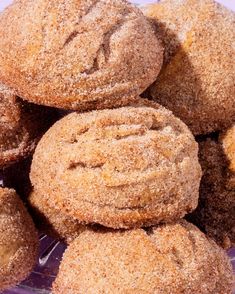 a pile of cookies sitting on top of a purple plate