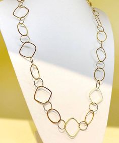 Everyday Gold Loop Long Necklace: a fusion of modern design and timeless allure. Crafted with precision from premium stainless steel and bathed in a luxurious gold plating, this necklace offers a contemporary open-link style that exudes both simplicity and sophistication. Its adjustable longer-length ensures the perfect drape for every neckline, while the sturdy lobster clasp ensures a secure fit. Whether worn as a single long strand or wrapped around for a dynamic layered look, this necklace pr Rectangular Links Jewelry In Yellow Gold Stainless Steel, Modern Formal Jewelry With Clavicle Chain, Elegant Stainless Steel Chain Necklace, Modern Yellow Gold Jewelry, Modern Formal Clavicle Chain Jewelry, Minimalist Stainless Steel Oval Link Jewelry, Modern Matte Gold Stainless Steel Jewelry, Gold Oval Link Stainless Steel Jewelry, Modern Gold Plated Box Chain Necklace