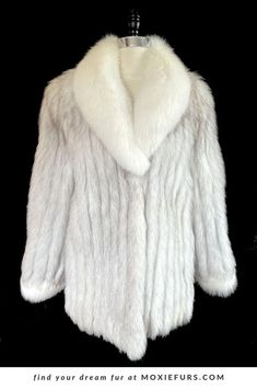 a white fur coat on a black background