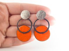 Orange drop earrings. Contemporary earrings. Geometric earrings. Circle drop earrings. Modern silver earrings. Enamel earrings. Women gift Modern orange earrings of silver and enamel. From the Pètals collection. These pieces are a one-of-a-kind handmade earrings. Measures: 43mm length and 23mm width. You can choose and customize the color of the enamel. And also the silver finish. Closure: push back. Very comfortable and lighweight. These modern earrings are ideal for to wear every day! These ge Modern Enamel Jewelry With Matching Earrings, Orange Enamel Earrings Nickel Free, Nickel-free Orange Enamel Earrings, Modern Silver Earrings With Black Enamel, Modern Black Enamel Earrings For Gift, Silver Earrings With Black Enamel As A Gift, Modern Black Enamel Earrings As Gift, Black Enamel Sterling Silver Drop Earrings, Sterling Silver Drop Earrings With Black Enamel