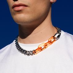 A robust stainless steel curb chain attached to quick link hardware and clear orange acrylic links. This necklace comes in two sizes and is finished with a fitted lobster clasp closure. materials: stainless steel, acrylic measurement: available in 18 inches and 20 inches Rave Aesthetic, Streetwear Jewelry, Edgy Aesthetic, Industrial Hardware, Chain Link Necklace, Curb Chain, Link Necklace, Wearable Art, Chain Link