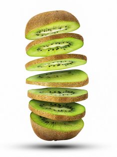 sliced kiwi fruit stacked on top of each other