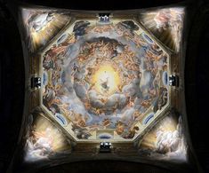 an artistic painting on the ceiling of a church