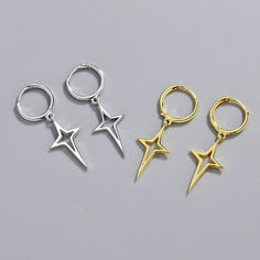 These earrings embody a delicate balance between modern charm and timeless allure, showcasing intricately crafted hollow star pendants that gracefully dangle and capture the light. Brown One Piece, Solid Necklace, Stars Earrings, Purple One Piece, Silver Gold Earrings, Silver Star Earrings, Short Dress Styles, Silver Style, Fashion Pattern