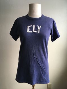 "1960s crew neck t-shirt Russell Southern Company cotton made in USA blue white ELY lettering sewn on authentic age wear faded, light pilling, soft label size L (see below) measures, lying flat, shoulder-17\" sleeve-5 1/2\" chest-18\" length-27\"" Long Sweaters Cardigan, Levis Denim, Ely, Vintage 60s, Long Cardigan, Olympia, White Leather, Cotton T Shirt, Perfect Pair