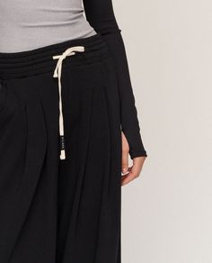 DETAILS: Color: Black Made w/ super soft mid-weight terry fabric Wide leg relaxed fit pants w/ smocked drawstring elastic waist Side slant pockets 54% Cotton, 46% Polyester Machine wash SIZE & FIT: Inseam: 28 5/8" Waist: 13 1/8" Model is wearing size S Relaxed Fit Pants, Terry Fabric, Fit Pants, Pants Black, Workout Pants, Black Pants, Elastic Waist, Wide Leg, Relaxed Fit