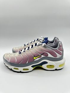 Elevate your sneaker game with these Nike Air Max Plus in Violet Dust/High Voltage. The high top shoe shaft style and synthetic upper material provide added support and style. The shoe width is medium and the US shoe size is 6. These sneakers are perfect for any athletic occasion with their high-quality design and comfortable fit. The product line is Wmns Nike Air Max Plus and the style code is FN8007 500. Don't miss out on this opportunity to add these stylish shoes to your collection. Nike High-top Sneakers With Abzorb Midsole, Nike Dynamic High-top Sneakers With Boost Technology, Nike Dynamic High-top Sneakers, Dynamic High-top Sneakers, Nike High-top Sneakers With Abzorb Midsole For Light Sports, Mid-top Custom Sneakers With Air Cushioning For Streetwear, Custom Mid-top Sneakers With Air Cushioning For Streetwear, Custom Mid-top Sneakers For Streetwear With Air Cushioning, Nike Air Cushioning Lace-up Sneakers