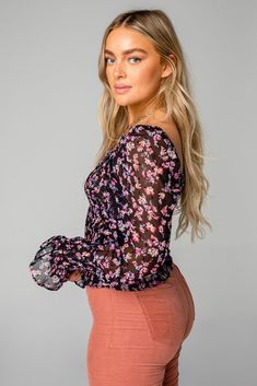 buddylove: cassie smocked long sleeve top - mystic Off-shoulder Top With Smocked Bodice For Fall, Fall V-neck Ruched Smocked Top, Flowy Puff Sleeve Tops With Elastic Sleeves, Fall Long Sleeve Blouse With Elastic Shoulders, Feminine Floral Smocked Top For Fall, Flowy Smocked Top For Spring, Feminine Fall Smocked Top With Floral Print, Fitted Smocked Top With Lantern Sleeves For Fall, Stretch Ruched Long Sleeve Blouse