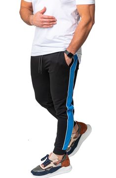 Athleisure is reinvented in these comfy joggers that leave others in the dust with supersoft fleece, bold side stripes and a skinny fit. Elastic/drawstring waist Front scoop pockets 92% cotton, 8% elastane Hand wash, dry flat Made in Turkey Adidas Relaxed Fit Athleisure Joggers, Relaxed Fit Three Stripes Sweatpants For Jogging, Sporty Joggers With Three Stripes And Relaxed Fit, Relaxed Fit Athleisure Joggers With Three Stripes, Sporty Blue Sweatpants With Three Stripes Branding, Blue Sporty Sweatpants With Three Stripes Branding, Sporty Blue Joggers With Three Stripes Branding, Sporty Sweatpants With Side Stripes And Relaxed Fit, Blue Sporty Joggers With Ribbed Waistband