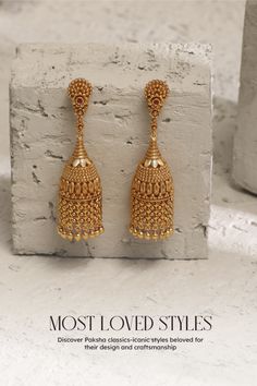 The intricate floral design and elongated cylindrical shape come together in perfect harmony, showcasing artisanal mastery. Crafted from 925 silver, these jhumkas exude elegance with a contemporary twist. Don't miss our exciting offer – enjoy a remarkable 10% discount using code BEST10. Indian Gold Earrings Teardrop, Gold Jhumka Earrings Temple Jewelry, Traditional Luxury Yellow Gold Jhumkas, Gold Plated Silver Jewellery Indian Earrings, Luxury Gold Plated Jhumkas For Festivals, Luxury Gold Plated Round Jhumkas, Luxury Yellow Gold Traditional Jhumkas, Luxury Gold Round Jhumkas, Luxury Yellow Gold Jhumkas For Wedding