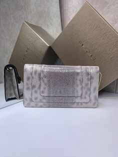 Size: 25cm*13cm*4.5cm It comes with Dust box, Care manual, Tag, and Paper bag. Designer Beige Envelope Bag, Designer White Envelope Bag, Designer White Rectangular Evening Bag, Designer Rectangular Clutch For Travel, Beige Rectangular Evening Bag For Mobile Phone, Beige Rectangular Shoulder Bag As Gift, High-end Rectangular Case Bag As Gift, High-end Rectangular Case Bags As Gifts, Travel Clutch With Dust Bag, Rectangular