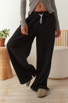 Wardrobe-staple Out From Under straight-leg sweatpants that you'll want to wear every day. With an ultra-soft feel, these baggy sweatpants have a relaxed straight leg finished with a side-split hem. Find them exclusively at Urban Outfitters. Features Out From Under Hoxton baggy sweatpants Made to be lived in straight-leg sweatpants Relaxed slouchy fit Straight leg Side pockets Easy pull-on drawstring waist UO exclusive Content + Care 58% Cotton, 42% polyester Machine wash Imported Size + Fit Mod 2000s Aesthetic Clothes, Winter Sweatpants, Wide Leg Pants Women, Sweatpants Women, Baggy Sweatpants, Black Sweats, 2000s Aesthetic, Wide Leg Sweatpants, Baggy Trousers