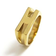 This 24k gold plated personalized signet ring displays your choice of initial letter in a block font, simply choose the initial you want and we will make it to a meaningful gift to a unique person that shows how much he means to you. This statement-making initial H ring is eye-catching and perfect for any special occasion or for everyday wear, be sure that you will enjoy your rose gold initial ring.Customization:• You can order this ring in sterling silver or different shades of gold plating - r Rectangular Yellow Gold Initial Ring For Gift, Anniversary Initial Ring With Rectangular Shape, Luxury Gold Initial Ring For Promise, Rectangular Gold Initial Ring For Gift, Gold Signet Ring With Initials For Promise, Modern Initial Ring With Polished Finish As Gift, Modern Monogram Signet Ring For Gift, Gold Luxury Monogram Initial Ring, Modern Personalized Initial Ring In Yellow Gold