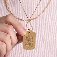 The Shea Mother of Pearl Medical Dog Tag Necklace in Yellow Gold is a stunning dog tag necklace featuring a mother of pearl inlay set in a 14k gold plated base and a gold tone medical caduceus symbol, perfectly layered with a gold tone accent chain. Each Shea Medic Alert Dog Tag Necklace features the internationally recognized medical caduceus symbol to alert medical personnel to your medical information that is custom engraved on the back side of the dog tag. Heart Stent, Medical Caduceus, Caduceus Symbol, Mother Of Pearl Inlay, Pearl Inlay, Medical Alert, Medical Information, Engraved Items, Dog Tag