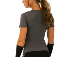 Look your best during workouts with the flattering I.F. Pro Short Sleeve V-Neck Top. The compression fabric on this workout top is great for athletic performance as well as for shaping your figure. Whether you work out at the gym, at a yoga studio or outdoors, this short-sleeve athletic top helps to keep your cool and comfortable during any physical activity. The V-neck style is tasteful and feminine, and you can pick from black, grey or fuchsia pink depending on your favorite fashions. Find a r Gray Fitted Moisture-wicking Activewear, Fitted Gray Crew Neck Activewear, Gray Fitted Crew Neck Activewear, Fitted Crew Neck Top For Pilates, Fitted Gray Sportswear Tops, Fitted Gray Training Top, Fitted Gray Top For Training, Fitted Gray Moisture-wicking Top, Gray Compressive Workout Top