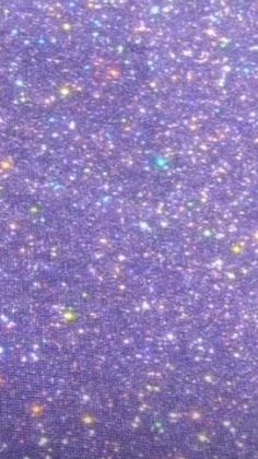 purple glitter fabric with small stars on it