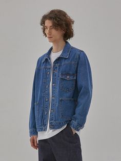 From Cork denim collaboration collection line, this trucker jacket is made from brand's own developed premium denim in washed indigo color. It has a relaxed straight silhouette, is detailed with classic light gold constrasting stitching and black nickel color buttons for vintage mood. It goes well with various styling as essential wardrobe item.- Collared neck- Button fastenings- Double tucks and bartack along front opening- One chest pocket- Two front patch pockets- Adjustable buttoned tabs at back hem- Relaxed fit- Brand's own developed premium denim Relaxed Fit Recycled Denim Jacket With Pockets, Spring Dark Wash Rigid Denim Jacket, Classic Denim Blue Jacket With Relaxed Fit, Classic Denim Blue Jacket In Relaxed Fit, Relaxed Fit Washed Denim Jacket In Recycled Denim, Classic Relaxed Fit Denim Jacket In Denim Blue, Relaxed Fit Medium Wash Recycled Denim Jacket, Classic Relaxed Fit Denim Jacket, Denim Blue Rigid Denim Jacket With Patch Pockets