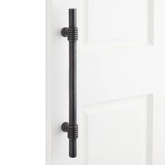 an open door with a black handle on it