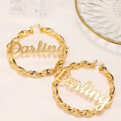 Name Twist Earrings, Custom Hoop Earrings, Personalized Earrings, Name Earrings, Large Big Hoop Earrings, Personalized Nameplate Jewelry . . . . . . . . . . . . . . . . . . . . . . . . . . . . . . . . .  * Product Description ♡ :  Introducing our captivating Name Twist Earrings, a pair of custom hoop earrings that beautifully combine personalized style with a unique twist design. These earrings are the perfect choice for those seeking a bold and personalized accessory that stands out from the cr Earrings Name, Meaningful Gifts For Her, Twist Earrings, Twist Pattern, Name Earrings, Big Hoop Earrings, Name Jewelry, Earrings In Gold, Large Earrings