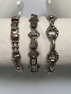 "Beautiful Vintage 3 Silver tone bracelets stackable  Length - one is 7.25\" and two are 7.5\" Wide - 0.25\" to 0.5\" Excellent vintage condition. Nice vintage piece for coordinated outfit or perfect gift for someone special." Vintage Silver Stackable Cuff Bracelet, Silver Stackable Metal Chain Bracelet, Silver Metal Stackable Chain Bracelet, Vintage Silver Stackable Bangle, Formal Silver Stackable Chain Bracelet, Stackable Vintage Bangle, Vintage Stackable Jewelry, Silver Collectible Bracelets, Stackable Bangles