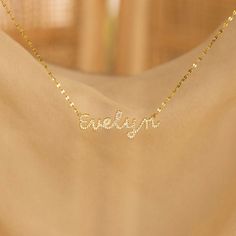 Our Pave Dream Script Name Necklace combines personalized charm with a touch of glamour. Featuring a dainty mirror chain with your chosen name or word in a delicate pavé setting, this elegant necklace is a stunning way to wear a name with pride and style. Wear it alone for a subtle statement or layer it with other necklaces to enhance its glowing effect ♡ SKU: MM-NM160F106 Product Details Material: High Quality Solid 925 Sterling Silver Finish: Sterling Silver ∙ 18K Gold ∙ Rose Gold Dimensions: Elegant Wedding Name Necklace With Adjustable Chain, Elegant Nameplate Charm Necklace, Elegant Name Necklace For Party, Rose Gold Adjustable Chain Name Necklace For Wedding, Mother's Day Name Necklace With Adjustable Chain For Party, Elegant Custom Name Necklace For Party, Elegant Custom Name Jewelry For Parties, Elegant Wedding Name Necklace With Delicate Chain, Customizable Gold Name Necklace For Party