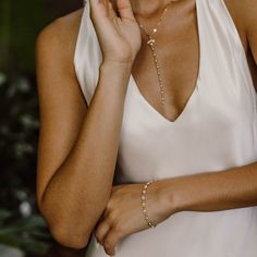 Our Pippa Pearl Bracelet is dainty + modern! What do we love about it? The tiny pearl accents add just a touch of traditional style in a modern way! This bracelet is perfect for any bridal event but can also be worn any time of the year or for any occasion which makes this the perfect gift! BRACELET FEATURES Materials: Brass, 14K Gold, Rhodium, Faux Pearl Finish: Choice of Yellow Gold or Rhodium Plating Dimensions: 6.5" with a 2" extender (can be worn up to 8.5") 14K gold-filled or sterling silv Feminine Adjustable Beaded Bracelets For Wedding, Pearl Chain Bracelet For Wedding, White Feminine Bracelets For Wedding, Wedding Pearl Chain Bracelet, Dainty Pearl Bracelet With Pearl Charm For Parties, Elegant Pearl Beaded Bracelets With Tiny Beads, Elegant Pearl Beaded Bracelet With Tiny Beads, Dainty Pearl Beaded Bracelets For Party, Feminine Pearl Bracelet With Charm For Wedding