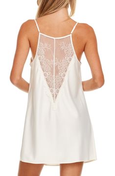 Stay in for the night wearing this sultry chemise crafted from rich satin charmeuse with lacy trim and adjustable straps to perfect the fit. 28" center front length (size Medium) Slips on over head V-neck Adjustable straps 100% polyester Hand wash, dry flat Imported Satin Chemise, Flora Nikrooz, Nightwear, Lace Trim, Adjustable Straps, Hand Wash, Nordstrom, Satin, Size Medium