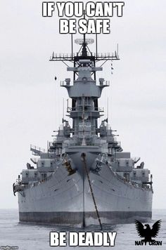 a large battleship floating on top of the ocean