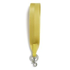 a yellow lanyard with a metal hook on the end and an eyelet clip attached to it