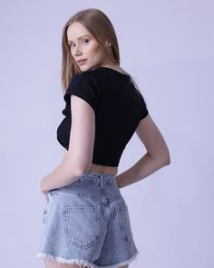 Exuding an air of sophistication, this slinky crop top is crafted from 97% cotton and 3% spandex with a medium stretch for a figure-flattering slim fit. With a round neck and short sleeves, it is further adorned with alluring tie front detailing. For best care, machine wash or take to a professional dry cleaner. Basic Spring Crop Top, Trendy Cotton Seamless Top, Trendy Seamless Cotton Top, Trendy Fitted Cropped Short Sleeve Top, Trendy Slightly Cropped Fitted Top, Fitted Short Length Crop Top For Spring, Trendy Cropped Seamless T-shirt, Trendy Seamless Cotton T-shirt, Trendy Fitted Elastane T-shirt