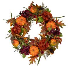 a wreath with flowers and leaves on it