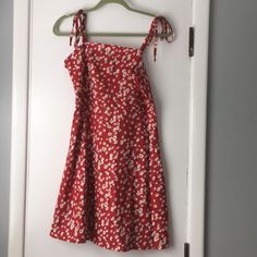 Brand New / Never Worn; Without Tags. (Shein Doesn’t Use Tags). Super Cute And Cool Sundress With Adjustable/Tie Straps. Red With Yellow/White/Blue Flowers! Zipper On Left Side. Casual Red Printed Mini Dress, Red Printed Mini Dress For Day Out, Red Cotton Summer Mini Dress, Red Cotton Mini Sundress, Red Cotton Mini Dress For Summer, Red Cotton Mini Dress For Spring, Casual Red Sundress For Brunch, Cute Red Cotton Mini Dress, Red Casual Sundress For Spring