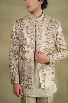 Sand Grey Short Jacket | Jatin Malik – B Anu Designs Floral Embroidered Long Sleeve Nehru Jacket For Reception, Reception Bandhgala With Floral Embroidery And Long Sleeves, Elegant Bandhgala With Floral Embroidery And Traditional Drape, Elegant Chikankari Embroidery Outerwear For Eid, Elegant Outerwear With Chikankari Embroidery For Eid, Long Sleeve Embroidered Nehru Jacket For Reception, Embroidered Long Sleeve Nehru Jacket For Reception, Long Sleeve Outerwear With Intricate Embroidery For Reception, Elegant Bandhgala With Floral Embroidery For Reception