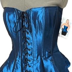 Tesa Classic By Escant Jewel Tone Sapphire Blue Corset/Bustier With Peplum Features Front Lace-Up To Customize Fit And Lift. A Zipper In The Back Allows For Easy On And Off. Size: 36 Measurement: - Armpit To Armpit (Flat) ~18.0" - Length: (Center To Hem) ~14.0"; (Armpit To Hem) ~13.0" Material: 55% Polyester, 40% Nylon, 5% Elastic Appearance: Excellent Condition, Never Worn, Nwt Blue Corset With Boned Bodice, Blue Sleeveless Evening Corset, Evening Blue Corset With Boned Bodice, Blue Overbust Corset For Costume Party, Blue Sleeveless Fitted Bodice Corset, Fitted Sleeveless Blue Corset, Sleeveless Blue Corset With Fitted Bodice, Blue Overbust Corset For Party, Blue Fitted Corset For Costume Party