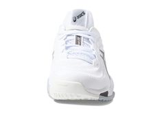 a white tennis shoe on a white background