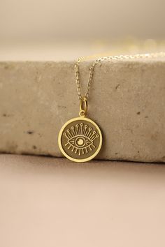 Gold Evil Eye Pendant -  Evil Eye Gold Necklace ● Material of pendant: Solid Gold 14k ( REAL GOLD ) ● Metal Stamp: 14k ( REAL GOLD ) ● The pendant is available in 5 sizes: - 12,7 mm / 0.5 inches (Diameter) - 14,0 mm / 0,55 inches ( Diameter ) In the photos - 15,3 mm / 0.6 inches ( Diameter ) - 16,5 mm / 0,65 inches ( Diameter ) - 19,1 mm / 0,75 inches ( Diameter ) ( In the photos the size is 14mm / 0.55 inches Diameter ) ( Jump Ring inner diameter: 4 mm ) ● Material of chain: Solid gold 14k ( RE Symbolic Charms Pendant Necklaces, Symbolic Pendant Necklaces With Charms, Symbolic Pendant Necklace With Charms, Yellow Gold Round Medallion Necklace With Charms, Gold Symbolic Charm Necklaces For Anniversary, Symbolic Round Medallion Necklace With Locket, Yellow Gold Medallion Necklace With Charms As Gift, Yellow Gold Medallion Necklace With Charms, Symbolic Locket Necklace For Anniversary