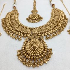 Gold Temple Jewelry With Hand Set Details, Diwali Heavy Gold Plated Jewelry, Elegant Gold Bridal Necklace For Rituals, Antique Gold Temple Necklace For Wedding, Antique Gold Temple Bridal Necklace As Gift, Traditional Kundan Gold Jewelry, Traditional Gold Kundan Jewelry, Heavy Gold Plated Temple Jewelry, Yellow Gold Jewelry With Intricate Design For Rituals