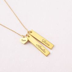 "This beautiful grandma necklace is engraved with your children's names on each charm. It's a perfect gift for your loved one with up to 5 personalized charms. PRODUCT INFO * Material: Solid 925 Sterling Silver * Dimensions: Bar charm measures ~ 1 1/4\" x 1/4\" (32 x 6.5mm). Heart charm measures ~3/8\"x5/16\" (9.5 x 8.2mm) * Word limits: 1 name/charm * By default, silver charm comes with BLACK engraving and gold-plated charm comes with CLEAR engraving HOW TO ORDER * Select your preferred finishi Personalized Birthstone Necklace For Birthday And Mother's Day, Personalized Birthstone Name Necklace For Mother's Day, Nameplate Necklace For Father's Day, Mother's Day Nameplate Birthstone Necklace, Father's Day Nameplate Necklace With Personalized Name, Father's Day Nameplate Necklace, Name Necklace Gift For Mom, Mother's Day Birthstone Necklace With Name For Birthday Gift, Customizable Yellow Gold Charm Necklaces For Mother's Day