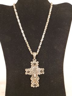 A well designed, elaborate Cross Pendant Necklace with 4 black round stimulant stones and Great Matching Chain with clasp Elegant Metal Cross Necklace With Adjustable Chain, Black Metal Cross Chain Necklace, Elegant Metal Cross Pendant Necklace, Metal Cross Jewelry With Adjustable Chain, Ornate Black Metal Necklace, Ornate Formal Jewelry With Chain, Black Pendant Necklace With Intricate Design, Elegant Cross Necklace With Lobster Clasp, Elegant Cross Jewelry With Lobster Clasp