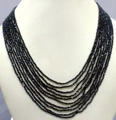 Black Spinel Necklace, Natural Black Spinel 2mm Rondelle Faceted Beaded Jewelry Necklace, Black Spinel 10 Strand Jewelry Necklace Gemstone :- Black Spinel Size :- 2mm Approx Strand :- 10 Strand Shape :- Rondelle Faceted Color :- Black Quality :- AAA GRADE https://www.etsy.com/in-en/shop/LatestBeadsJewellery?ref=simple-shop-header-name&listing_id=720939504 Your Feedback is very Important for us. If you have any problem regarding packaging or product, kindly contact us to resolve the issue bef Black Multi-strand Necklace With Faceted Beads, Black Rondelle Beaded Necklaces, Black Beaded Rondelle Jewelry, Black Necklace With Spacer Beads For Party, Black Rondelle Gemstone Bead Necklace, Black Beaded Rondelle Necklace, Black Faceted Beaded Necklaces For Party, Elegant Black Rondelle Beaded Necklaces, Black Rondelle Gemstone Beaded Necklace