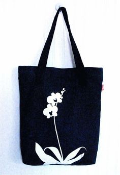 Sale item!!The original price was $43 now is $25This orchid tote is perfect for your casaul days. It's simple and modern. This roomy bag easily fit everything you need, with style and individuality.Navy blue canvas outerOrchid screen - print in off-whiteLined in floral cotton with inner pocketMagnetic snap closureDark brown faux leather straps, length 25"Approximate size : 14" x 15.5" x 2.5"*Actual colors may not match monitor *Thank you for stopping by my shop:) Modern Blue Cotton Bags, Bag Drawing, Canvas Bag Design, Drawing Bag, Painted Tote, Diy Bags Patterns, Painted Bags, Blue Tote Bag, Design Bag