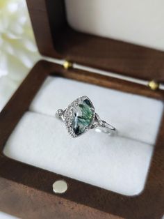 This ring is a special and unique piece of jewel for you your best friends and a perfect gift for all Bride lovers. It is made entirely of pure sterling silver 925. The rings comes with the shape of a white crescent moon holding a shiny and bright moss agate, a natural gemstone with inside filaments and patterns of green moss. Each moss agate will be different which makes this ring unique. Product details: Material: Sterling Silver 925 Color: Silver Ring Size: 5us, 6us, 7us, 8us, 9us, 10us, 11us Heirloom Crystal Ring As A Gift, Heirloom Crystal Ring As Gift, Heirloom Crystal Ring For Gift, Unique Crystal Ring As A Gift, Heirloom Crystal Ring With Accent Stones For Gift, Heirloom Crystal Ring With Accent Stones As Gift, Unique Moss Agate Ring For Wedding, Unique Moonstone Gemstone Ring As Gift, Unique Handmade Moonstone Ring Gift