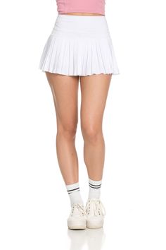 Next Restock Now Available for Pre-Order. NEW 2.0 ﻿Off-White Pleated Tennis Skirt is back and BETTER than ever. Now offering more sizes and sizing accuracy. Just like the original, it is best everyday piece to add to your wardrobe because of its versatility & functionality. The skirt features built-in spandex shorts that include a comfortable fit and side pockets for storage. This exclusively designed Gold Hinge skirt is made of quick dry material and can take on any activity such as golf, tenni Gold Hinge Skirt, White Pleated Tennis Skirt, Pleated Tennis Skirt, Vintage Repurposed, Tennis Skirts, Spandex Shorts, Athletic Top, White Skirt, Yoga Tops