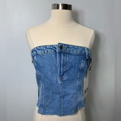 Zara The Jean Top Blue Denim Strapless Top With Zipper Closure On The Side Size Small Armpit To Armpit 16.5 Inch New With Tag #Corsettop #Y2k Style #Festival #Streetstyle #Fashion Fitted Denim Top With Zipper Closure, Blue Denim Sleeveless Tube Top, Trendy Blue Strapless Denim Top, Blue Denim Tube Top, Dark Wash Strapless Denim Top, Zara Fitted Denim Top, Denim Blue Denim Tube Top, Fitted Zara Denim Top, Fitted Blue Denim Top By Zara