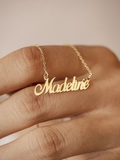 Imagine a necklace that holds a special place in your heart. Our personalized 14k gold name necklace offers a unique and meaningful way to express your love and affection. This exquisite piece, adorned with your chosen name, is a testament to the bond you share with a loved one. Whether it's a gift for your wife or a cherished keepsake for yourself, this personalized necklace is a symbol of enduring love and connection. Features and Benefits ✅ Customizable with your desired name ✅ Crafted from h Silver 14k Gold Name Necklace For Anniversary, Customizable 14k Gold Necklaces For Anniversary Gift, Customized Yellow Gold Necklace For Anniversary, 14k Gold Name Necklace For Anniversary, Customized Nameplate Necklaces For Anniversary, Customizable 14k Gold Name Necklace For Anniversary, Customizable 14k Gold Necklace As A Gift, Personalized Gold Necklaces With Meaningful Style, Yellow Gold Name Necklace For Anniversary Gift