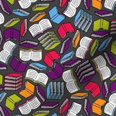 an image of many different colored books on a black background with white lines in the middle